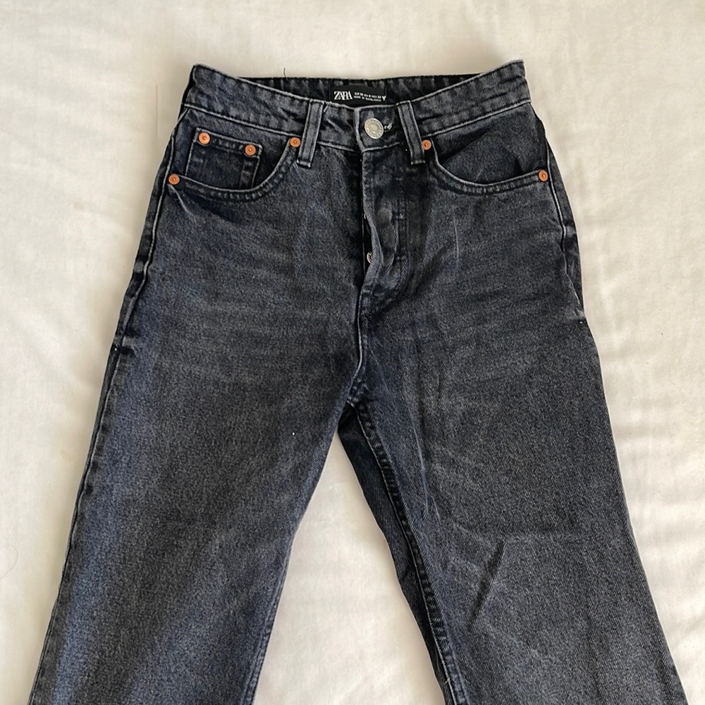 Black distressed hem jeans